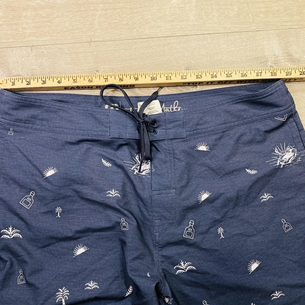 Travis Mathew Board Shorts Mens 38 Blue Skull Tropical Swim Trunks‎ Beach Print